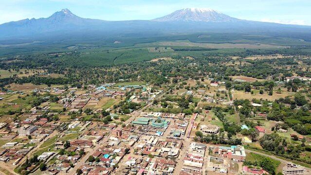 Mount kilimanjaro view . Small settlement of houses with Kilimanjaro background. Kilimanjaro Africa kenya Oloitokitok area.