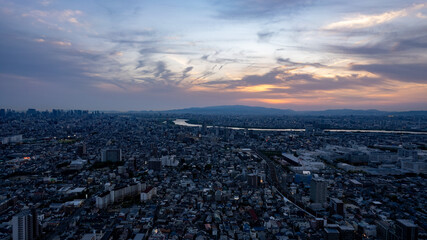 Fototapeta na wymiar 大阪府門真市上空から夕暮れの街並みをドローンで空撮
