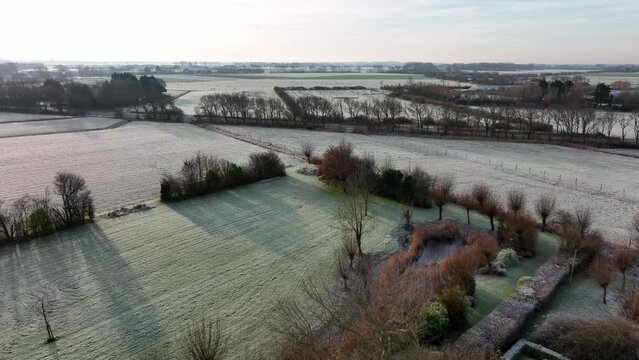 beautiful aerial images above the flat Dutch Oostkapelle arable land in winter time