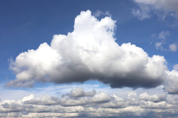 Naklejka na ściany i meble White cumulus clouds in blue sky. Summer cloudscape, beautiful weather background