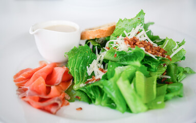 Salad with Crispy garlic bread-Italian and salad dreesing, selective focus.