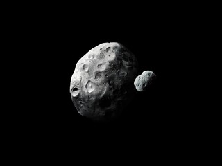 Asteroids in the solar system. Space rocks covered with craters. Planetary satellites on a black background. 