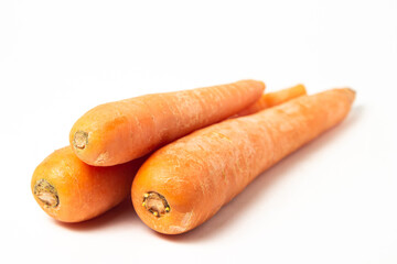 Carrot isolated on white background. Delicious and healthy vegetable. Pure carrots without batwa