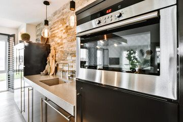 Modern ovens in stylish kitchen