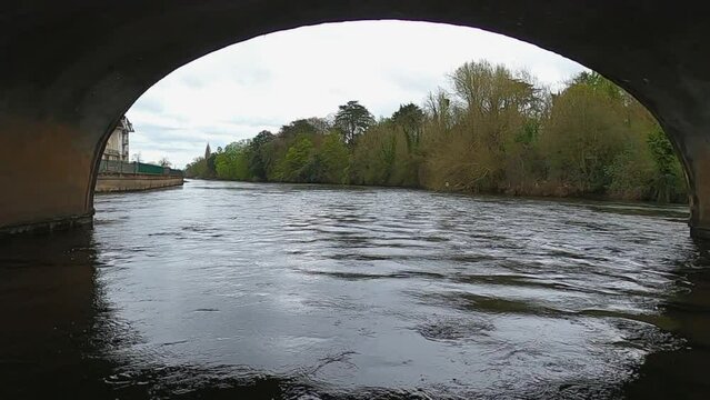 POV floating under stone arch old Waterford Rd bridge on River Suir