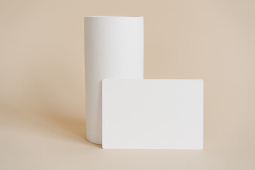 Place card mock up, name card mock up,  minimalist branding concept. White terrazzo vase on beige background, Instagram mock up