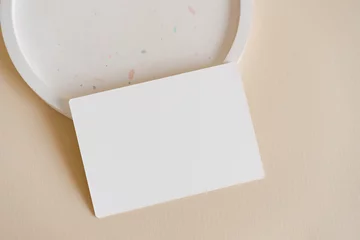 Minimalist menu mock up card on the terrazzo plate on beige background. Modern template  © Анна В