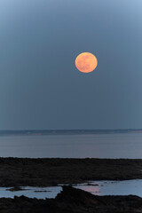 Sunset or moon-rise on the seaside in Morbihan, Bretagne, France