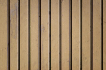 Surface of corrugated sheet, angular in a brown shade.