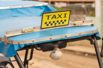 Close up of taxi sign on the roof