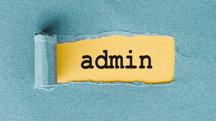 Under torn blue paper appears text ADMIN on yellow background