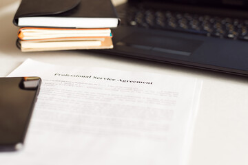 Obraz premium Financial documents - notebooks, smartphone, laptop, documents in the office. Business, science, long hours of work.