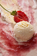 Organic strawberry ice cream texture and ball.