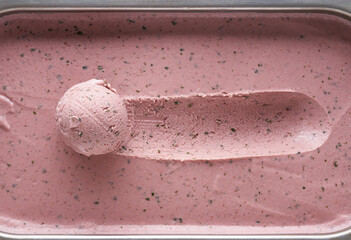 Organic raspberry ice cream texture and ball.