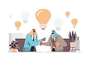 arab businesspeople brainstorming and shaking hands during meeting teamwork agreement creative idea successful project