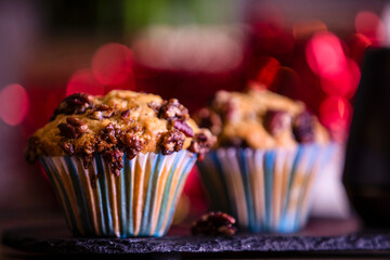 Chocolate chip muffins in plate.