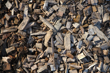 Wood pieces and sawdust close-up background