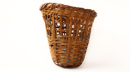 Traditional small basket (doko) in Nepali language  used for carrying items. Made of bamboo. White Background or isolated Background