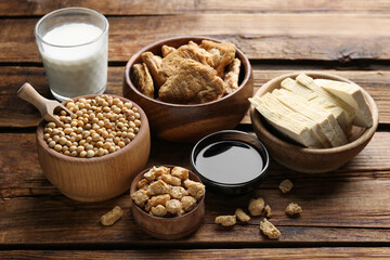 Different natural soy products on wooden table