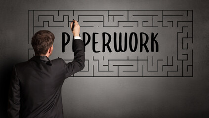 businessman drawing maze concept