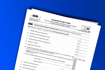 Form 5695 documentation published IRS USA 44531. American tax document on colored