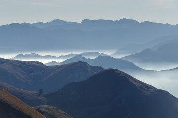 Fototapeta na wymiar Stura di Demonte Valley mountains, view above from the Colle Fauniera mountain pass, Piedmont, Italy