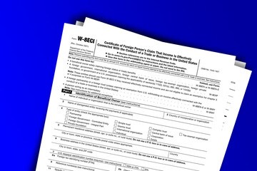 Obraz premium Form W-8ECI documentation published IRS USA 44296. American tax document on colored