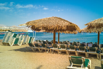 Concept of blessing and happy vacation. Relaxing public beach of the Red Sea, Middle East 