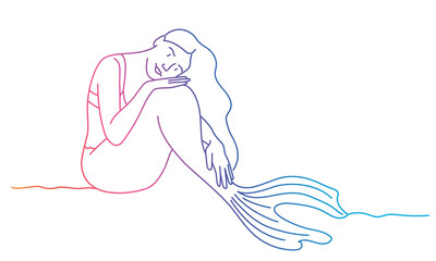 Mermaid girl sitting in a pensive pose.