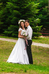 Fototapeta premium Happy bride and groom after wedding ceremony