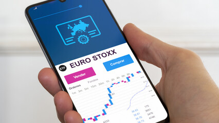 fondo etf negociado en bolsa europea, Datos del mercado de valores en el teléfono. Análisis de negocios de una tendencia ETF. Blue chips mercado europeo. Texto en español	