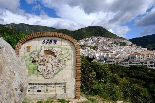 Welcome sign to the town of Oj&eacute;n. It's a village of white Andalucian houses that sits in the mountains behind Marbella, Malaga, Spain. 