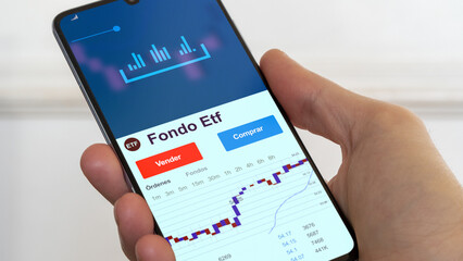 Fondo etf de inversión negociado en bolsa mundial, Datos del mercado de valores en el teléfono. Análisis de negocios de una tendencia ETF. Blue chips. Texto en español	