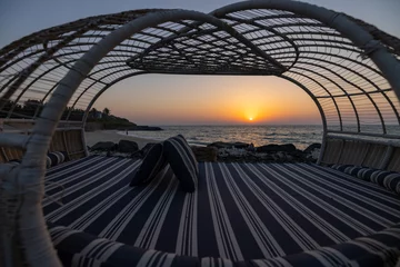 Fotobehang Sunset at Zaya Nurai luxury island resort in the Arabian Gulf near Abu Dhabi, United Arab Emirates © hyserb