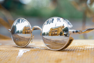 Reflection of Karachi's Victorian architecture on the sunglasses