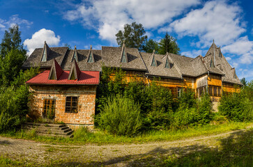 Fototapeta na wymiar one wooden house of abandoned sanatorium in Ukrainian Carpathian