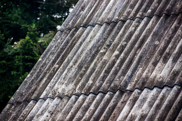 close-up of a wavy grey slate roof
