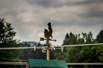 a weathercock on the top of the roof