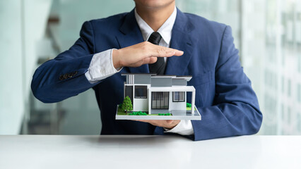 Real estate agent offer house design and contract. Approval of a contract to buy or sell a home. Offers mortgage loans and home insurance concept.