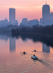 Vertical shot of a beautiful river during sunrise in Boston, USA