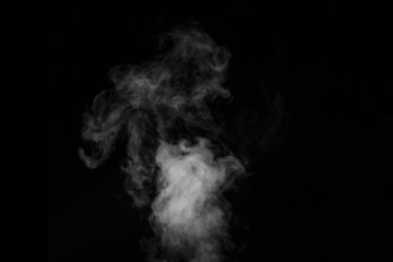 Curly white steam rising up and splashing water scattering in different directions isolated on a black background. Can be used as background, design element