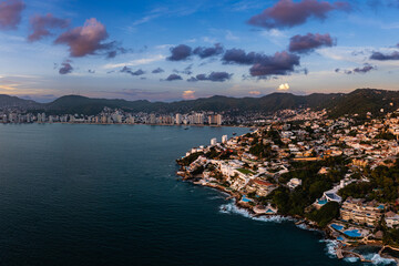 Aerial photography of the sunset in the Bay of Acapulco from the Las Brisas area