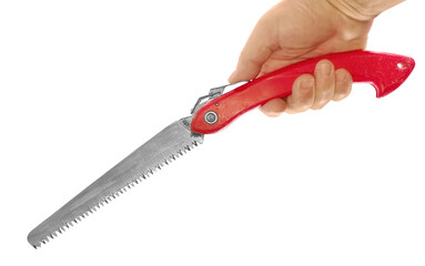 Hand holding a pruning folding saw isolated on a white background