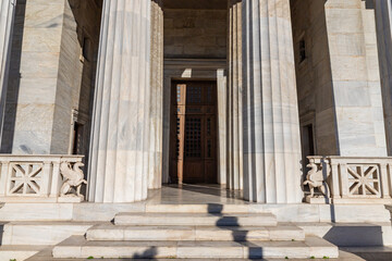 Obraz premium Vallianeio Megaron entrance and stairs, sunny day, blue sky. The historic building housed the National Library until 2017, Athens, Greece
