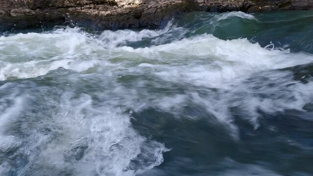 River video footage landscape side view showing water current wave flowing