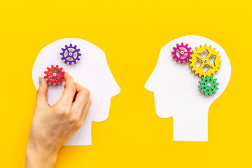 Teamwork concept, brain storm. Communication between two paper human heads - obrazy, fototapety, plakaty