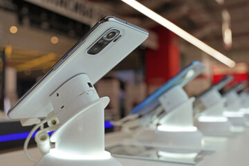 Smartphones are sold in an electronics store.