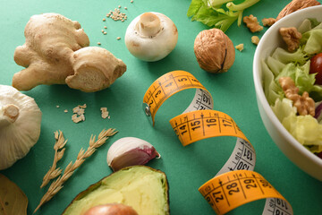 Balanced food and body care with vegetables on green table