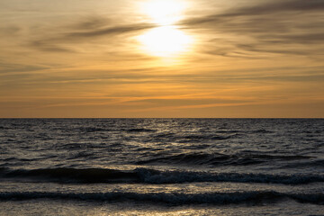 Baltic sea coast at colorful summer sunset