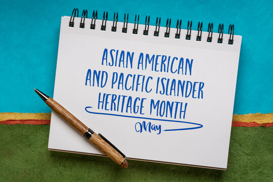 Asian American and Pacific Islander Heritage Month, May - handwriting in a sketchbook against abstract landscape, reminder of cultural event